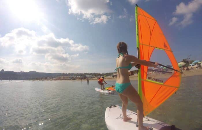 Windsurfers racing during a course in Malta